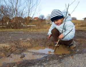 Playing in puddle